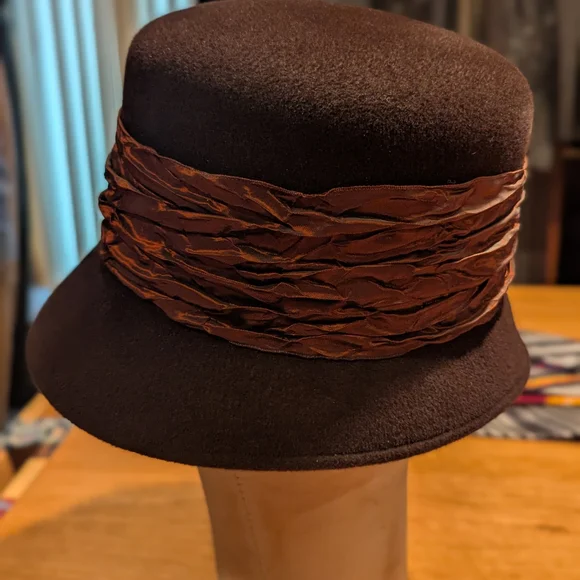 Elegant Brown Hat with Floral Accent